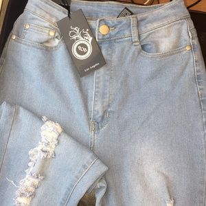 Light wash high waisted distressed